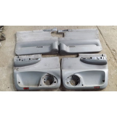  Обшивка двери (дверная карта) комплект к  Lancia  Zeta,  2000