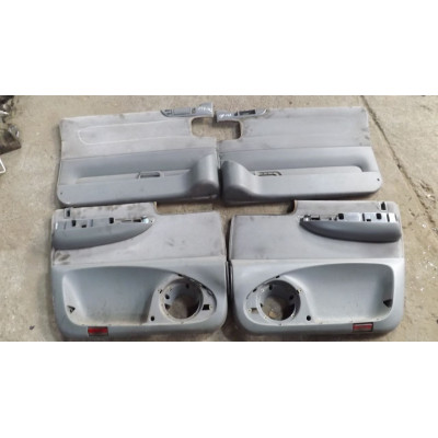  Обшивка двери (дверная карта) комплект к  Lancia  Zeta,  2000