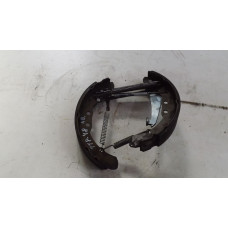  Механизм развода задних тормозных колодок левый к  Audi  100,  1985