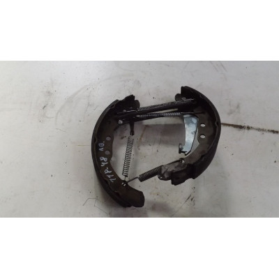  Механизм развода задних тормозных колодок левый к  Audi  100,  1985