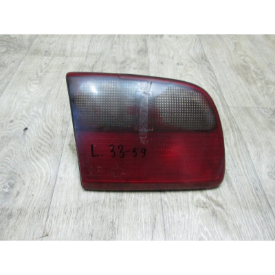  Фонарь крышки багажника левый к  Opel  Omega,  1996