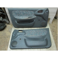  Обшивка двери (дверная карта) комплект к  Daewoo  Lanos,  1999