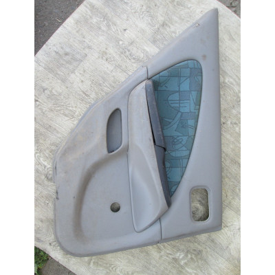  Обшивка двери задней левой (дверная карта) к  Nissan  Almera,  2000
