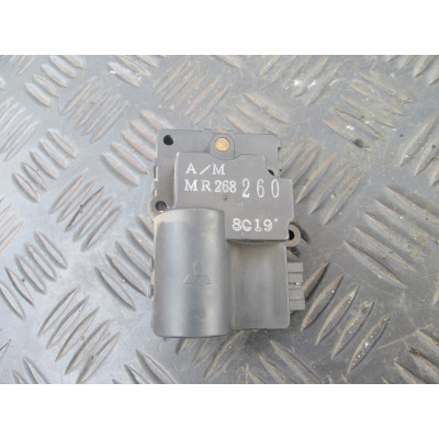  Моторчик заслонки печки к  Mitsubishi  Galant,  1998