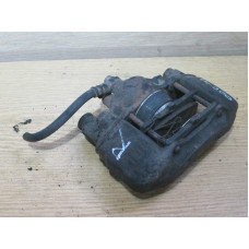  Суппорт передний правый к  Mazda  323,  1997