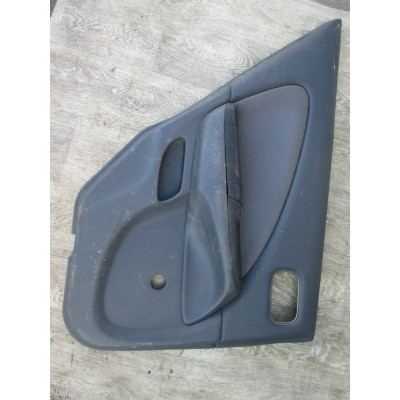  Обшивка двери задней левой (дверная карта) к  Nissan  Almera,  2000
