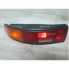  Фонарь задний левый к  Mazda  323,  1994