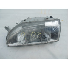  Фара левая к  Renault  19,  1994