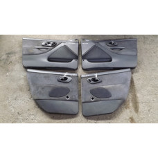  Обшивка двери (дверная карта) комплект к  Ford  Mondeo,  1998