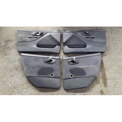  Обшивка двери (дверная карта) комплект к  Ford  Mondeo,  1998