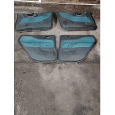  Обшивка двери (дверная карта) комплект к  Mitsubishi  Space Star,  1998