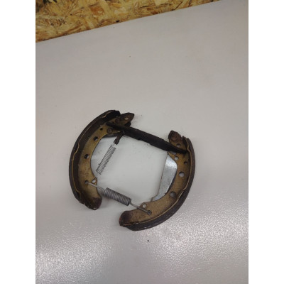 Механизм развода задних тормозных колодок левый к  Audi  80,  1990