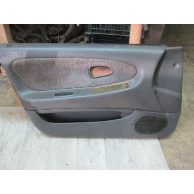 Обшивка двери передней левой (дверная карта) к  Mitsubishi  Lancer,  1994