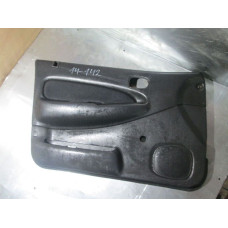  Обшивка двери передней левой (дверная карта) к  Mazda  323,  1997