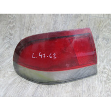  Фонарь задний левый к  Mazda  626,  1997