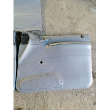  Обшивка двери (дверная карта) комплект к  Dodge  Caravan,  1999