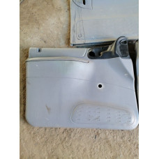  Обшивка двери (дверная карта) комплект к  Dodge  Caravan,  1999