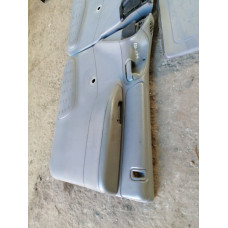  Обшивка двери (дверная карта) комплект к  Dodge  Caravan,  1999