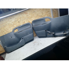  Обшивка двери (дверная карта) комплект к  Renault  Kangoo,  1998