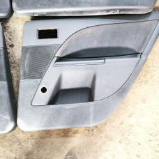  Обшивка двери (дверная карта) комплект к  Ford  Mondeo,  2001