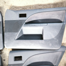  Обшивка двери (дверная карта) комплект к  Ford  Mondeo,  2001