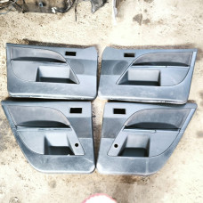  Обшивка двери (дверная карта) комплект к  Ford  Mondeo,  2001