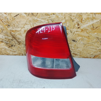  Фонарь задний левый к  Mazda  Protege,  2001